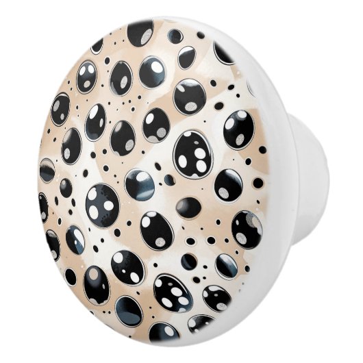 Zwarte vlekken en Stippen op Tan Keramische Knop (Rechts)