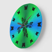 zwarte vlinder op groene regenboog in lederoptica grote klok (Hoek)