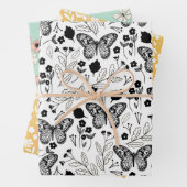 Zwarte vlinder pastel bloemen inpakpapier vel (In situ)