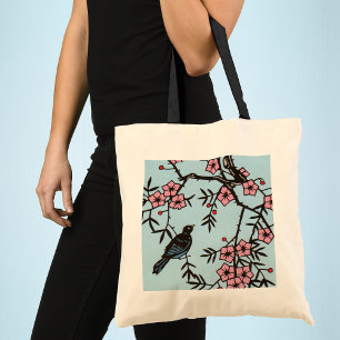 Zwarte vogel kersenbloesemboom tote bag