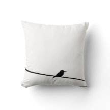 Zwarte vogel op een draad