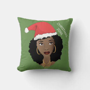 Zwarte vrouw, rode kerstmuts, huidig jaar, groen kussen