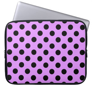 Zwarte wandelpunten op lila laptop sleeve
