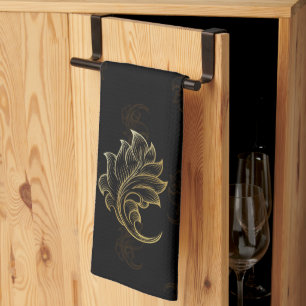 Zwarte washand met een elegante gouden barok theedoek