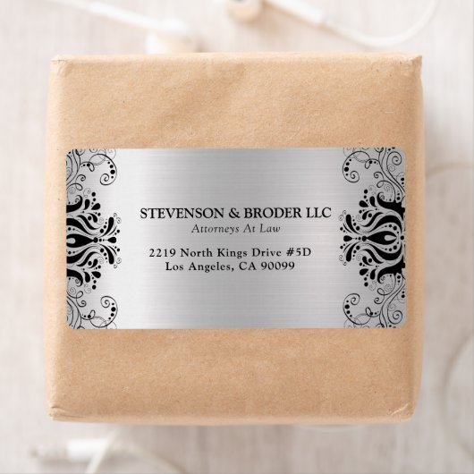 Zwarte wervelende zilveren achtergrond etiket (Insitu)