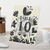 Zwarte Whimsical Bloemen Tafel Nummer Reclamebord Met Voetstuk (Insitu)