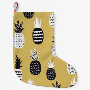 Zwarte, witte ananas, gele achtergrond kleine kerstsok
