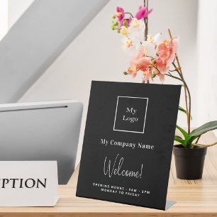 Zwarte witte bedrijfsnaam openinguren reclamebord met voetstuk