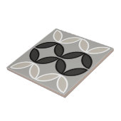 Zwarte witte en grijze ronde of bloempitten tegeltje (Zijkant)