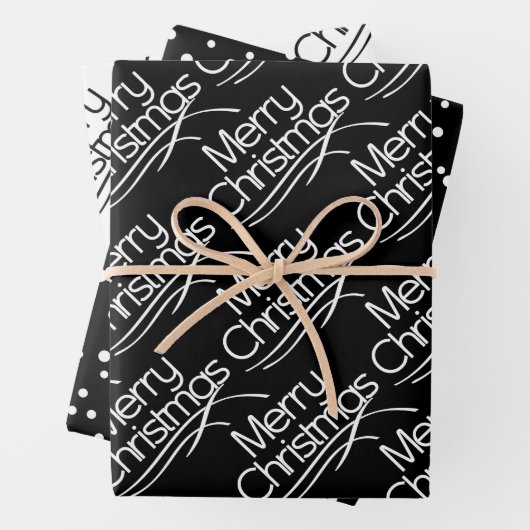 Zwarte, witte kersttypografie en stippen vakantie inpakpapier vel (In situ)
