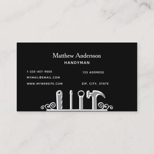 Zwarte zilveren gereedschappen, thuisreparateurs visitekaartje (Achterkant)