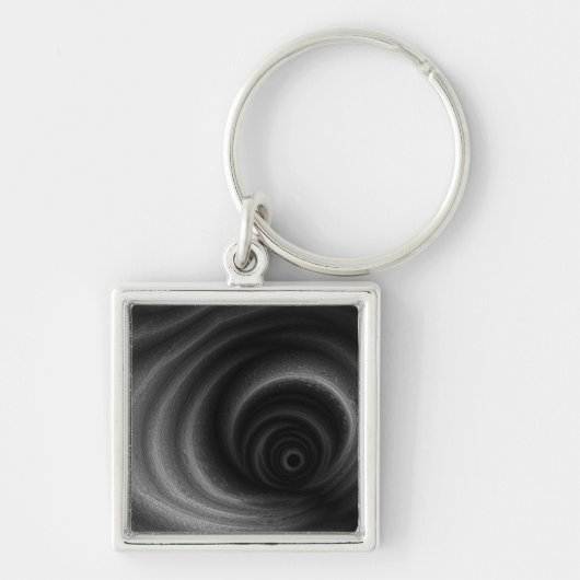 Zwarte zwaartekracht sleutelhanger (Voorkant)