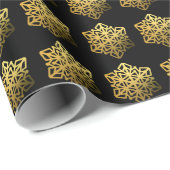 Zwartwitschilfers met gouden sneeuwvlokken cadeaupapier (Rol Hoek)