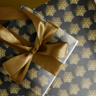 Zwartwitschilfers met gouden sneeuwvlokken cadeaupapier