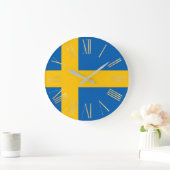 Zweedse vlag met gouden Romeinse cijfers Grote Klok (Huis)