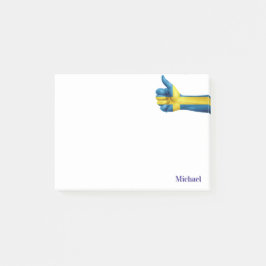 Zweedse vlag op een tobberplaat post-it® notes