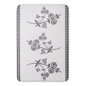 Zwemelflesje en vulling in sierpatroon badmat (Voorkant Verticaal)