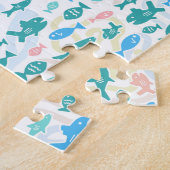 Zwemende vissen koken een onautisch patroon legpuzzel (Zijkant)