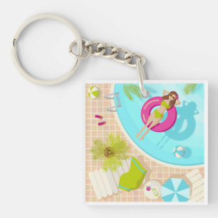 Zwemzwembad meisje in canvas tas op het strand van sleutelhanger