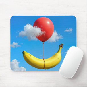Zwevende banaan en rode ballon  muismat