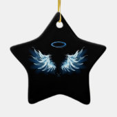 Zwevende engelenvleugels in het blauw op een zwart keramisch ornament (Achterkant)