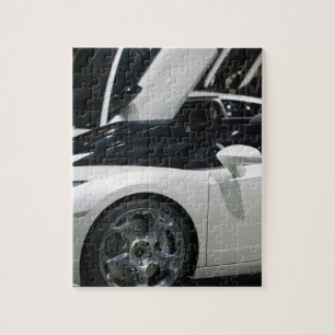 ZWITSERLAND, GENEVE: 75e jaarlijkse autosalon van  Legpuzzel