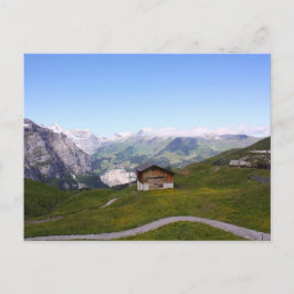 Zwitsers huis en alpen briefkaart