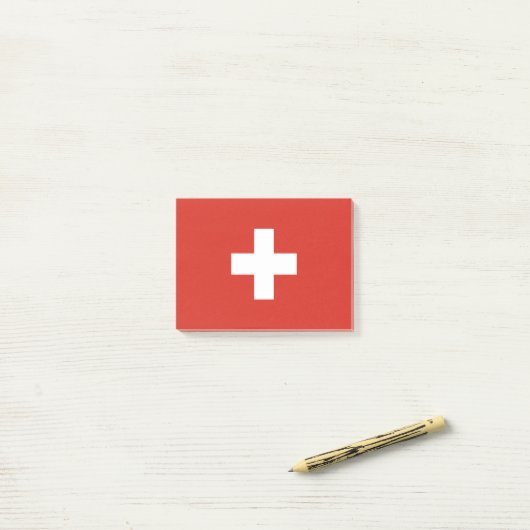Zwitserse vlag post-it® notes (Op bureau)